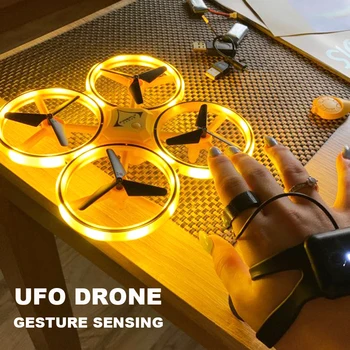 Mini UFO rc dört pervaneli helikopter İndüksiyon Drone akıllı saat Uzaktan Algılama Hareket Uçak El kumandalı drone İrtifa Tutun Robot Oyuncaklar