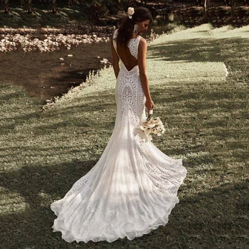 Muhteşem düğün elbisesi Dantel Plaj gelin kıyafeti Hollow Geri Kolsuz Dalma Yaka Fit ve Flare Vestido De Noiva